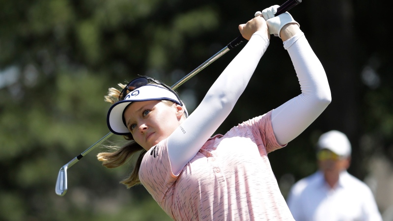 Brooke Henderson watches her tee shot on the second hole during the final round of the Pure Silk Championship golf tournament at Kingsmill Resort, in Williamsburg, Va., Sunday, May 26, 2019. (AP Photo/Steve Helber)