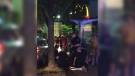 Police arrest a 22-year-old Surrey man following an alleged stabbing outside a McDonald's restaurant in East Vancouver on June 16, 2019. 