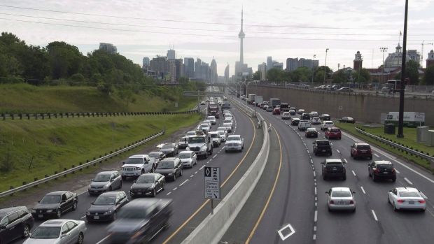 Vehicles travel along in Toronto on Monday, June 29, 2015. THE CANADIAN PRESS/Frank Gunn