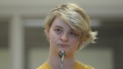 In this Sunday, June 9, 2019 photo, Denali Brehmer, 18, stands at her arraignment in the Anchorage Correctional Center in Anchorage, Alaska. Brehmer has been charged with first-degree murder in the death of Cynthia Hoffman. . (Bill Roth/Anchorage Daily News via AP)