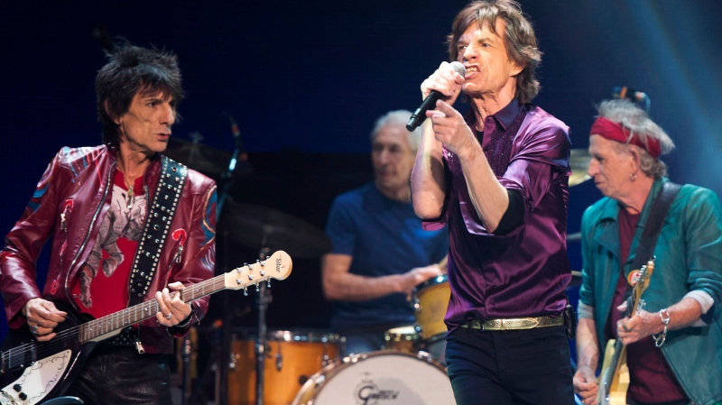 The Rolling Stones' Mick Jagger (centre), Keith Richards (right), Charlie Watts (back) and Ronnie Wood (left) perform during a concert in Toronto on Saturday May 25, 2013. All things considered, guitarist Ronnie Wood says the Rolling Stones count themselves pretty fortunate these days. (THE CANADIAN PRESS/Frank Gunn)