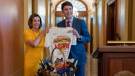 Speaker of the House Nancy Pelosi, D-Calif., and Canadian Prime Minister Justin Trudeau exchange gifts as they settle a wager over the recent NBA basketball championship game between her Golden State Warriors and his victorious Toronto Raptors, at the Capitol in Washington, Thursday, June 20, 2019. (AP Photo/J. Scott Applewhite)