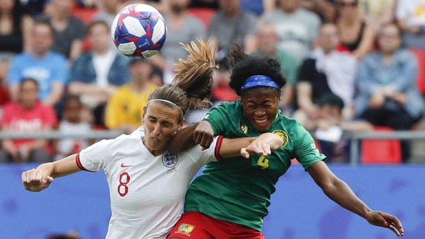 England and Cameroon in action