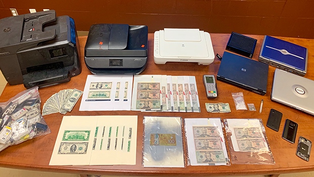 Items police seized from a counterfeit currency operation in Bradford. (Courtesy: South Simcoe Police)
