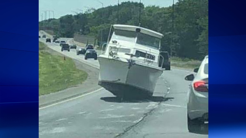 A boat blocking the westbound lanes of EC Row Expressway in Windsor on Sunday June 30, 2019. (Photo via Facebook/Brendan Laliberte)
