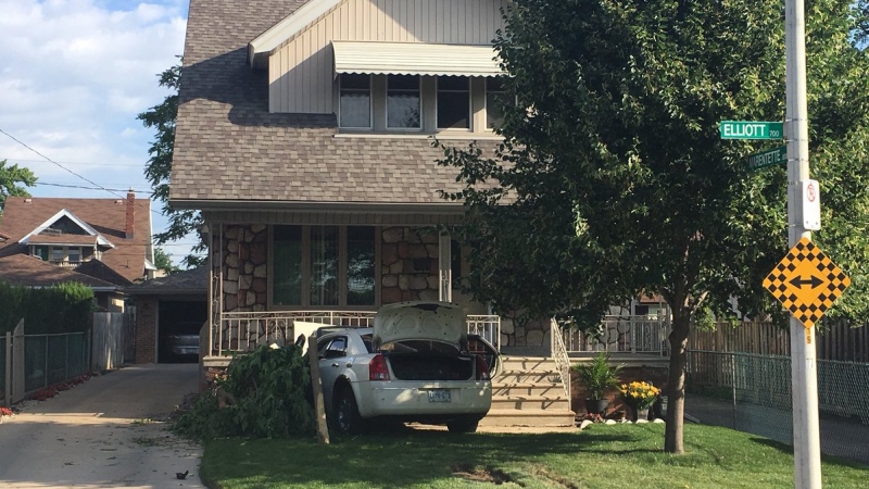 A car has smashed into home at Marentette Avenue and Elliott Street in Windsor, Ont,. on Tuesday July 2, 2019. (Chris Campbell / CTV Windsor) 
