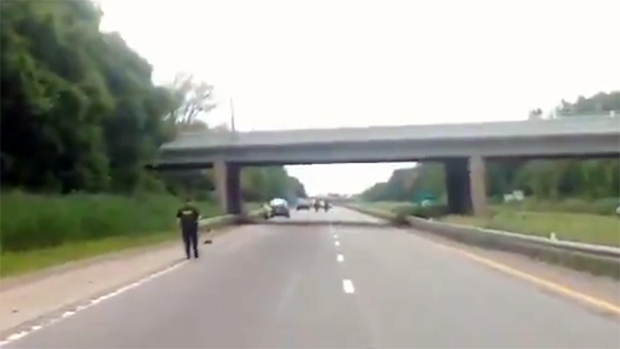 OPP are investigating after a man walking on Highway 403 was struck by a transport truck in Brantford, Ont. on Tuesday, July 2, 2019. (@OPP_WR / Twitter)