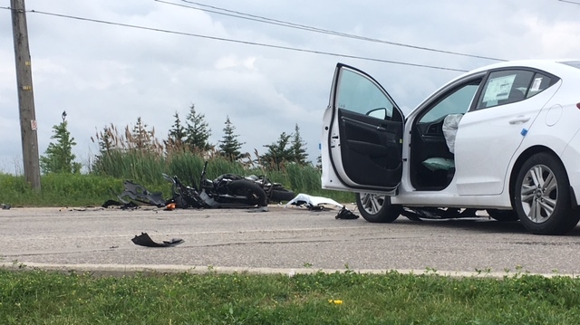 A car and a motorcycle after a crash