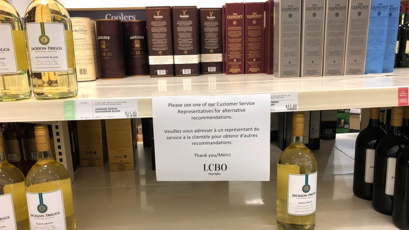A sign warning customers of a shortage of product at a LCBO store near St. Clair West and Spadina Avenue is seen. 