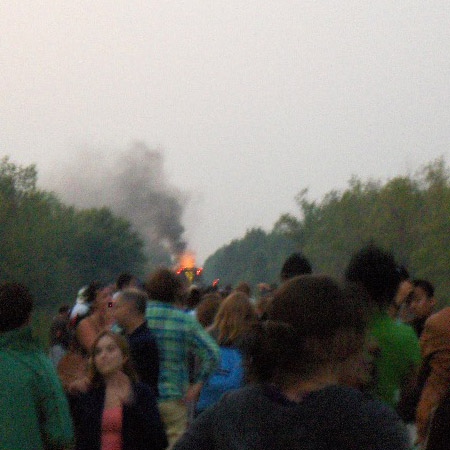 Via Rail train passengers stand on the tracks in a remote area in south Ottawa after the train's engine caught fire, Sunday. Aug. 16, 2008. Viewer photo