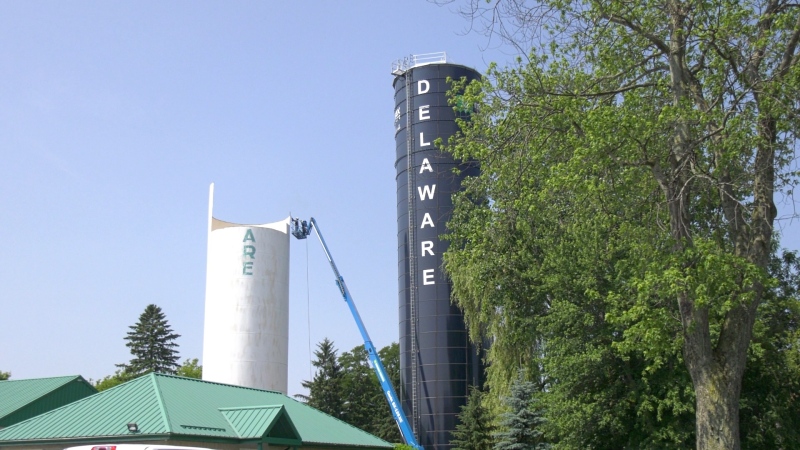 The demolition of the old water tower in Delaware, Ont. continues on Wednesday, July 10, 2019. (Marek Sutherland / CTV London)