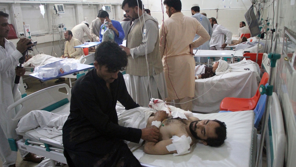 A wounded man receives treatment in Kabul