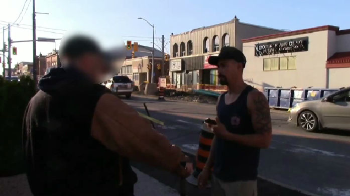 Justin Payne confronts a man who he says was trying to lure a child over the phone. (Justin Payne / YouTube)
