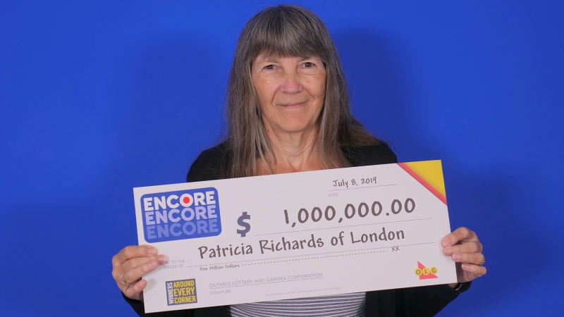 Patricia Richards picks up her million-dollar Encore win.