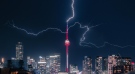 Lightning hits the CN Tower during an intense storm on July 20. (Instagram / tylersjourney)
