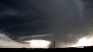 A supercell is seen over an area east of Calgary in a July 13, 2019, handout photo. As of Monday afternoon, there have been 18 tornadoes in the province according to Environment and Climate Change Canada. (THE CANADIAN PRESS/HO-Chris Kiernan)
