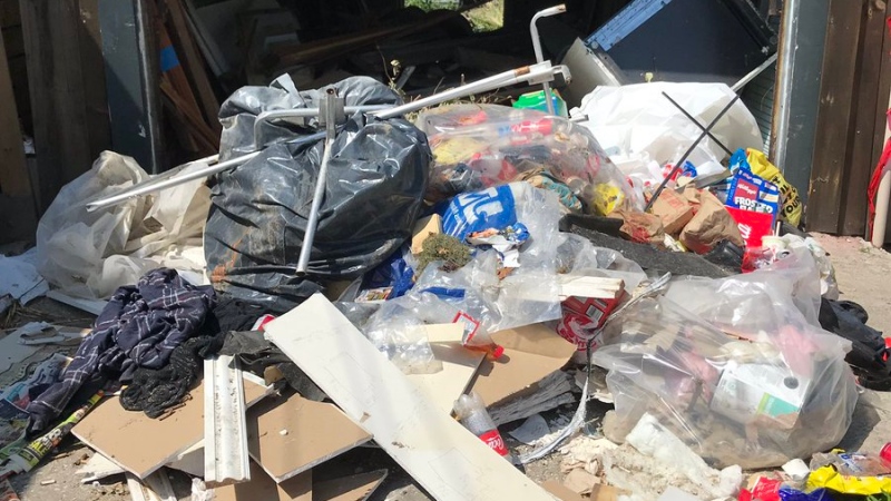 Neighbours complain about the garbage dumped at 658 Caron Avenue in Windsor on July 24, 2019. ( Michelle Maluske / CTV Windsor )