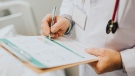 A doctor holds a medical chart. Doctors are calling for tighter restrictions on the sale of sodium nitrite to prevent the average consumer from accessing it. (Pexels)