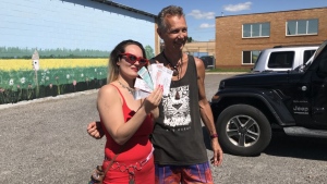 Bob Pearce and Angela Munroe have been traveling across Canada, catching every Def Leppard concert along the way. (Cally Stephanow / CTV Regina). 