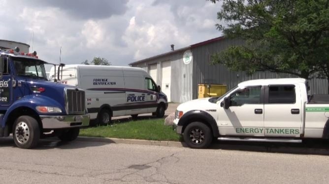 Police search a business for stolen property in east London, Ont. on Monday, July 29, 2019. (Gerry Dewan / CTV London)