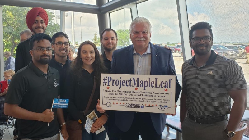 Windsor-Tecumseh MPP Percy Hatfield of the NDP joins those taking part in an anti-human trafficking awareness campaign at the Tilbury OnRoute rest stop on July 30, 2019. (Courtesy Percy Hatfield via Twitter)