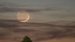  In this Jan. 9, 2008, file photo, one day past New, an early Waxing Crescent Moon is seen just after sunset from Tyler, Texas. (AP Photo/Dr. Scott M. Lieberman, File)