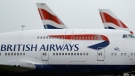 FILE - This Jan. 10, 2017 file photo shows British Airways planes parked at Heathrow Airport in London. (AP Photo/Frank Augstein, File)