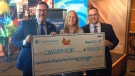 A cheque from OLG is presented to the Municipality of Chatham-Kent as part of the grand opening of Gateway's Cascades Casino in Chatham on August 8, 2019. (Alan Hadadean / CTV Windsor)