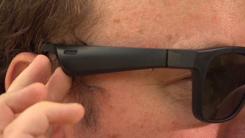 Jason Fayre uses a free smartphone app being tested in Canada designed to revolutionize the way blind people interact with the environment around them. 
