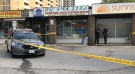 Police investigate after a man was found with serious injuries outside a Scarborough strip mall. (CTV News Toronto)