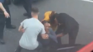 An alleged road rage incident during which a woman was crushed between two cars was caught on camera by a Canadian tourist vacationing in London, England.