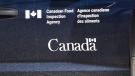 A Canadian Food Inspection Agency logo is seen on a truck on Sept. 27, 2007 northwest of Regina. THE CANADIAN PRESS/Troy Fleece