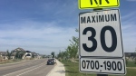 A 30 km/h speed limit sign posted at the start of a school zone in Regina. (Cole Davenport/CTV Regina)