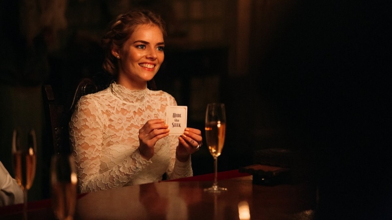 Grace, played by Samara Weaving, holds a hide and seek card in the upcoming film 'Ready or Not.' (Ready or Not/ Fox Searchlight Pictures/ Facebook)