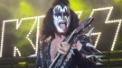 Gene Simmons, bass player for the band Kiss, performs in Holmdel, N.J., on Tuesday, July 20, 2004. (AP / Christopher Barth)