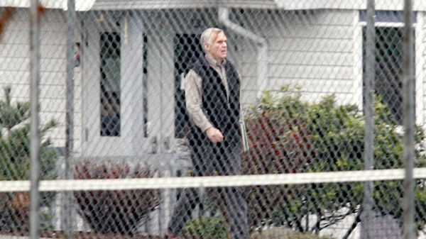 Colin Thatcher walks to a parole hearing at the Ferndale Institution in Mission, B.C. Wednesday Dec. 8, 2004. (Chuck Stoody / THE CANADIAN PRESS)
