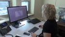 Dr. Liana Zanette looks at a scan of a birds brain in her research into PTSD in London, Ont. on Wednesday, Aug. 28, 2019. (Celine Zadorsky / CTV London)