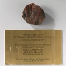 In this photo released by the Rijksmuseum in Amsterdam on Thursday, Aug. 27, 2009, a rock supposedly brought back from the moon, and a note from the then-U.S. ambassador is seen.  (AP / Rijksmuseum) 