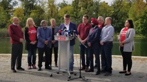Liberal Leader Dougald Lamont at centre as the party announced it would declare a climate emergency on day one if elected. (Daniel Timmerman/CTV News) 