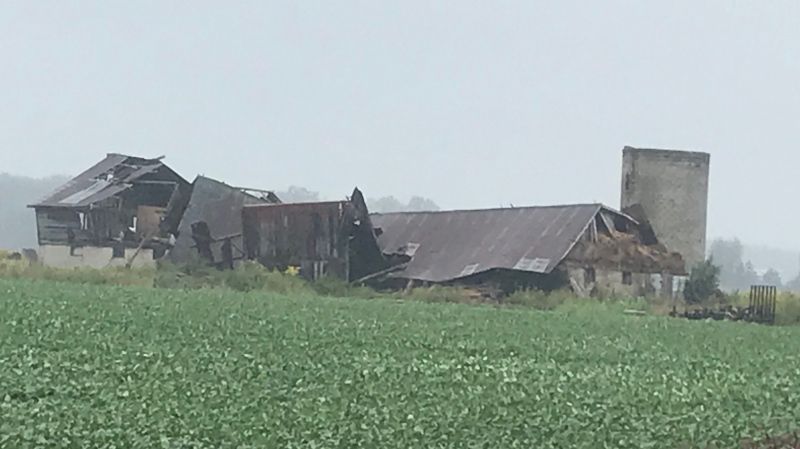 An older barn on Rokeby Line lies collapsed in the area of Petrolia, Ont. on Thursday, Sept. 12, 2019, a day after a storm tore through the area. (Sean Irvine / CTV London)