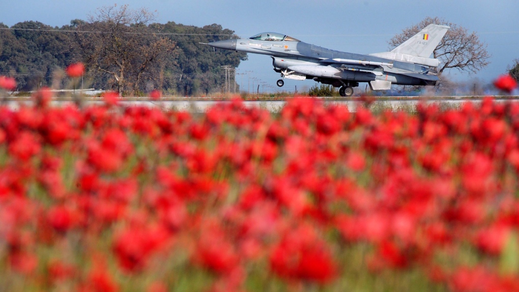 A Belgian F-16 fighter jet lands in Greece