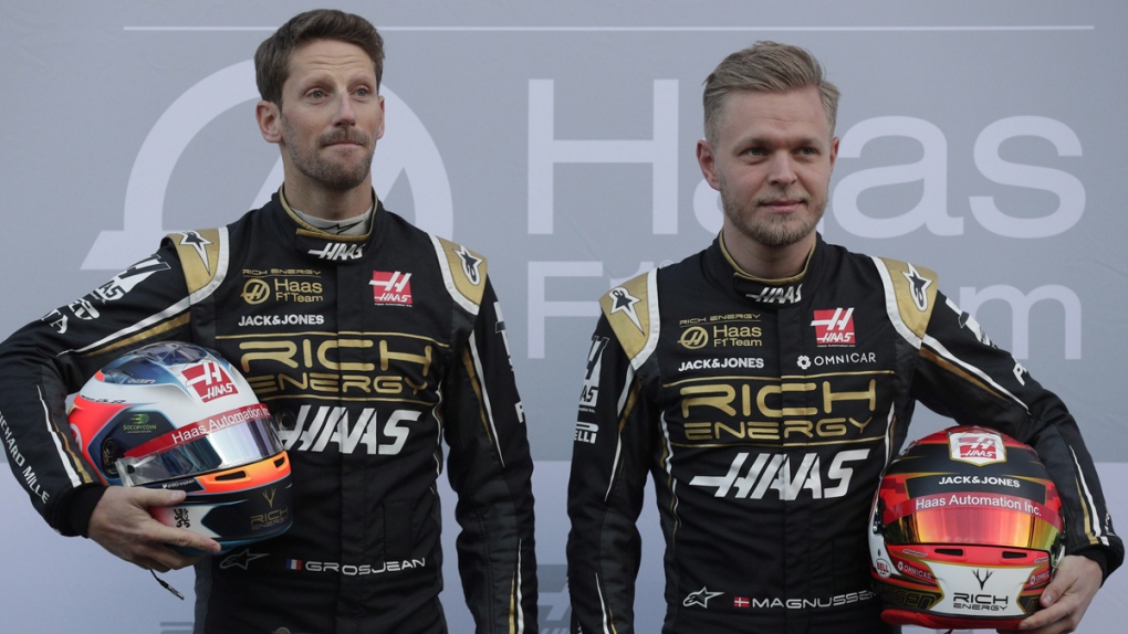 Kevin Magnussen, right, and Romain Grosjean