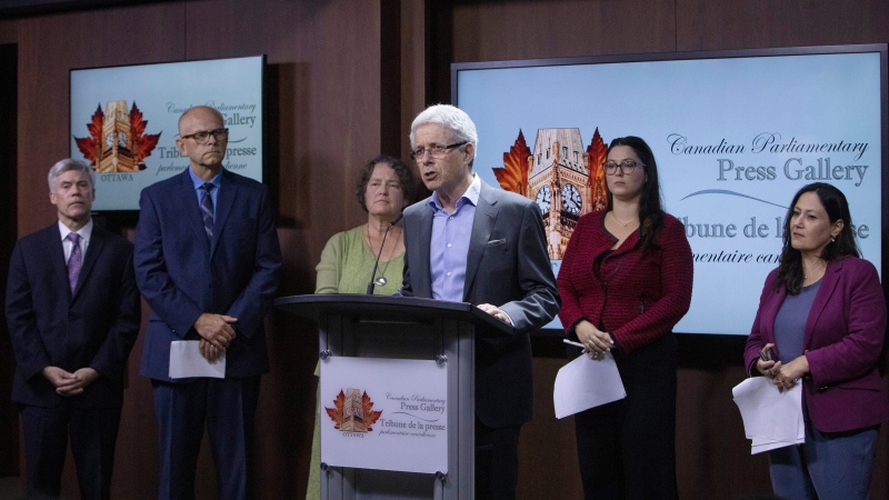 Dr. Sandy Buchman, centre, President of the Canadian Medical Association, holds a news conference in Ottawa, Thursday, September 19, 2019. Eight health organizations are calling for urgent action from the federal government to treat vaping like smoking. (THE CANADIAN PRESS/Fred Chartrand.)