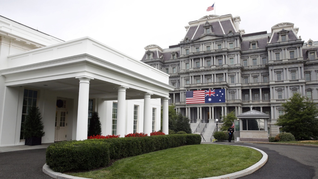 American, Australian flags hang at the White House