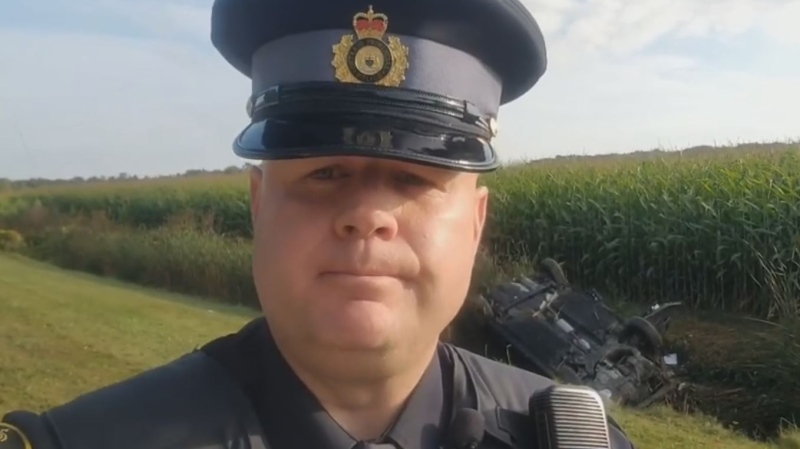 OPP Const. Ed Sanchuk discusses a fatal rollover crash in Norfolk County, Ont. on Friday, Sept. 20, 2019. (OPP West Region / Facebook)