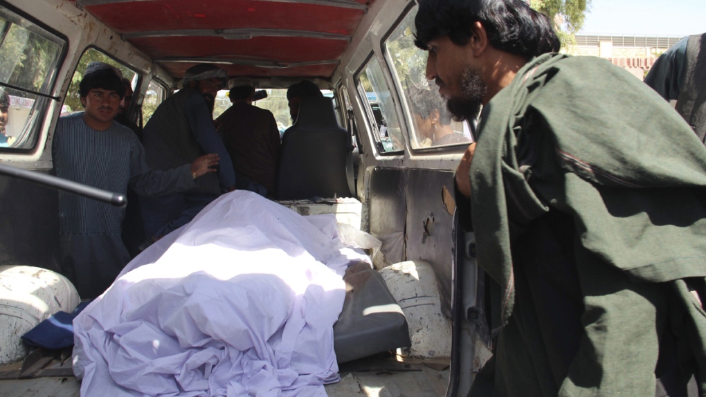 Transporting the body of a woman who was killed