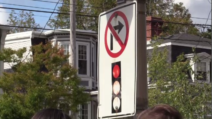 There are already a number of intersections where the practice is banned, but a motion before the city's transportation committee may open the door to an all-out ban.