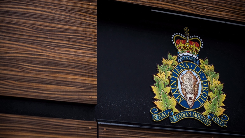 The RCMP logo is seen outside Royal Canadian Mounted Police "E" Division Headquarters, in Surrey, B.C., on Friday April 13, 2018. THE CANADIAN PRESS/Darryl Dyck