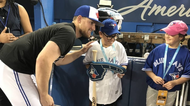 Boy, 8, gets wish to be a Toronto Blue Jay