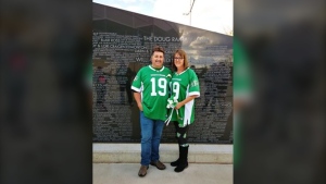 Lionel (L) and Glenda Dudchak (R) are shown after exchanging their vows in Rider jerseys outside Mosaic Stadium on Oct. 5. (Courtesy: Bonnie Bazarski)